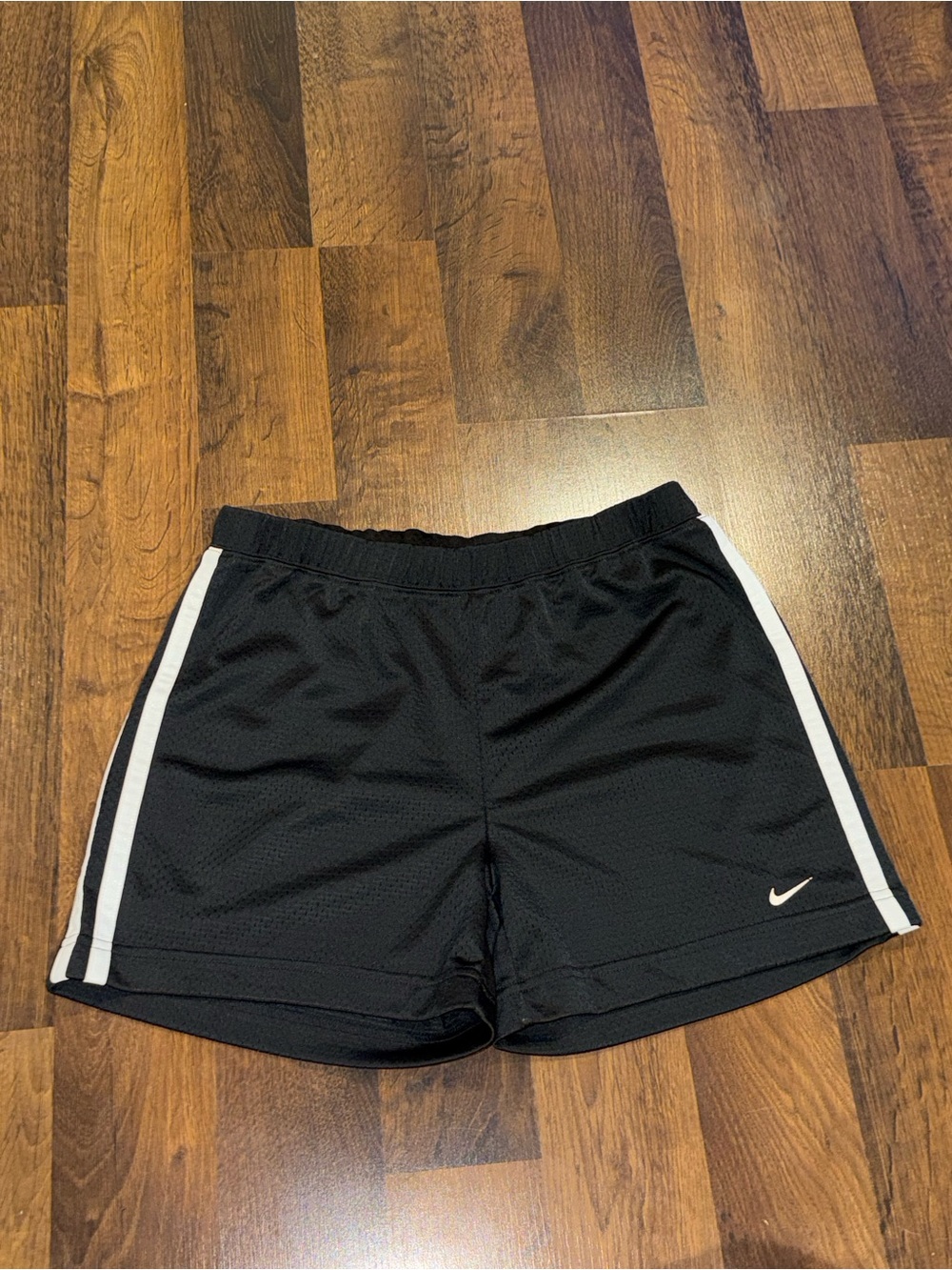 Nike Women's Black Athletic Shorts with White Side Stripe (size SMALL)